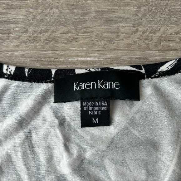 Karen Kane Leaves Pattern Cold Shoulder Bell Sleeve Top - Picture 7 of 15